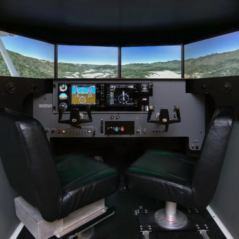 Redbird MCX interior: two seats, dual yokes and wrap-around visual screens